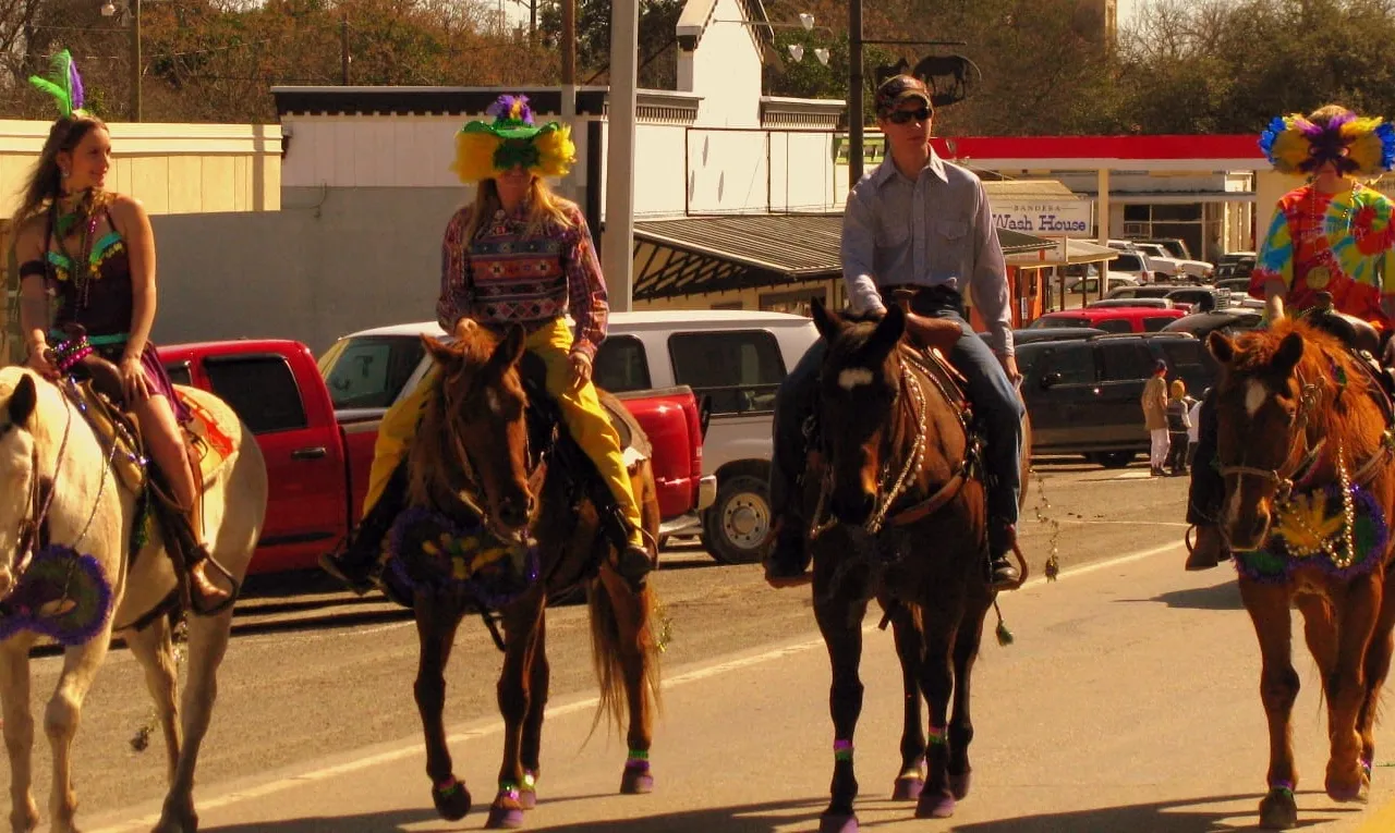 Cowboys and cowgirls celebrating at a Bandera, Texas festival