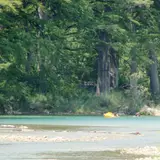 The clear Frio River flowing through Garner State Park in the Texas Hill Country