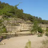 A limestone bluff along the Guadalupe River in Guadalupe River State Park, Texas