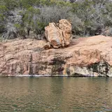 Devil's Waterhole at Inks Lake State Park, a rock-enclosed swimming area on the lake